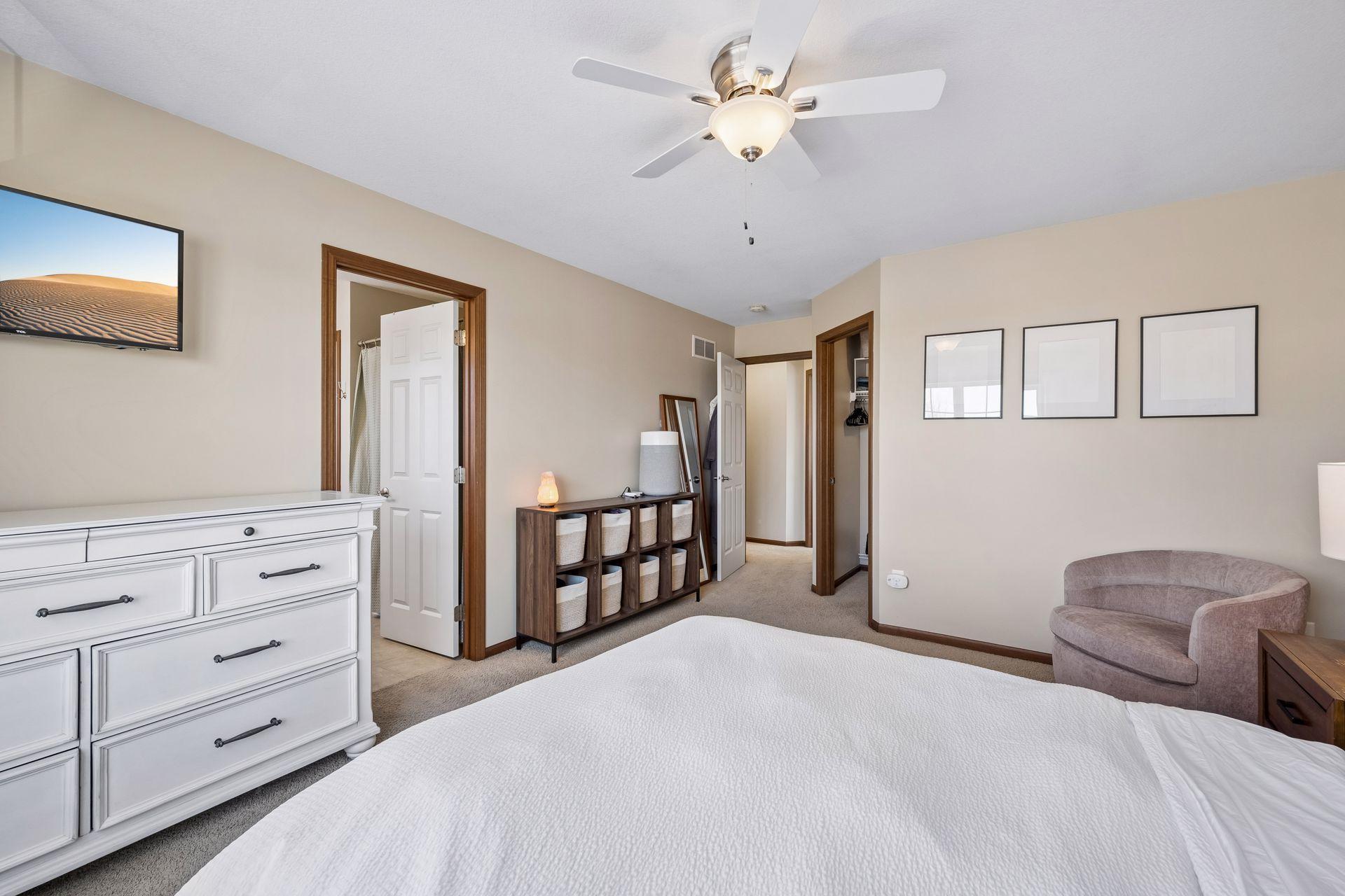 Primary bedroom is spacious with wall space for dressers or bookshelves.