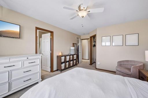 Primary bedroom is spacious with wall space for dressers or bookshelves.