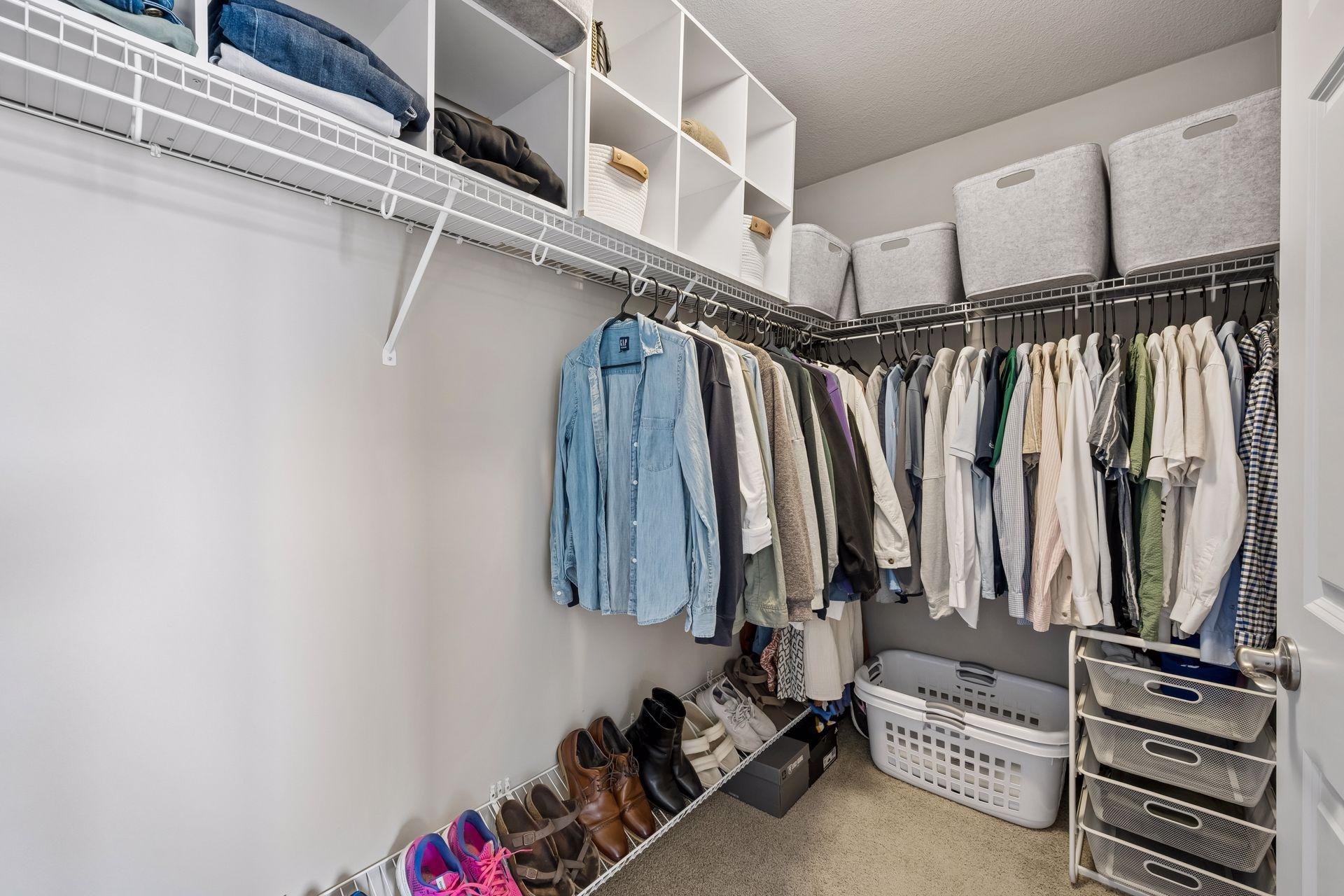 Primary walk-in closet is huge.