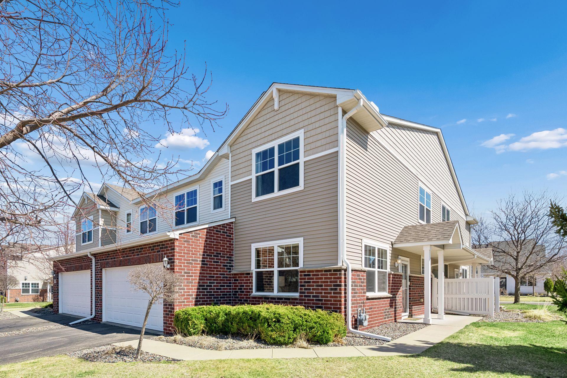 Welcome home to this sun-drenched end-unit in Wickford Village.