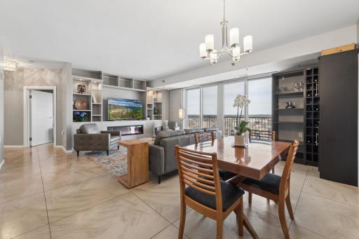 Floor to ceiling sliding glass doors lead to deck
