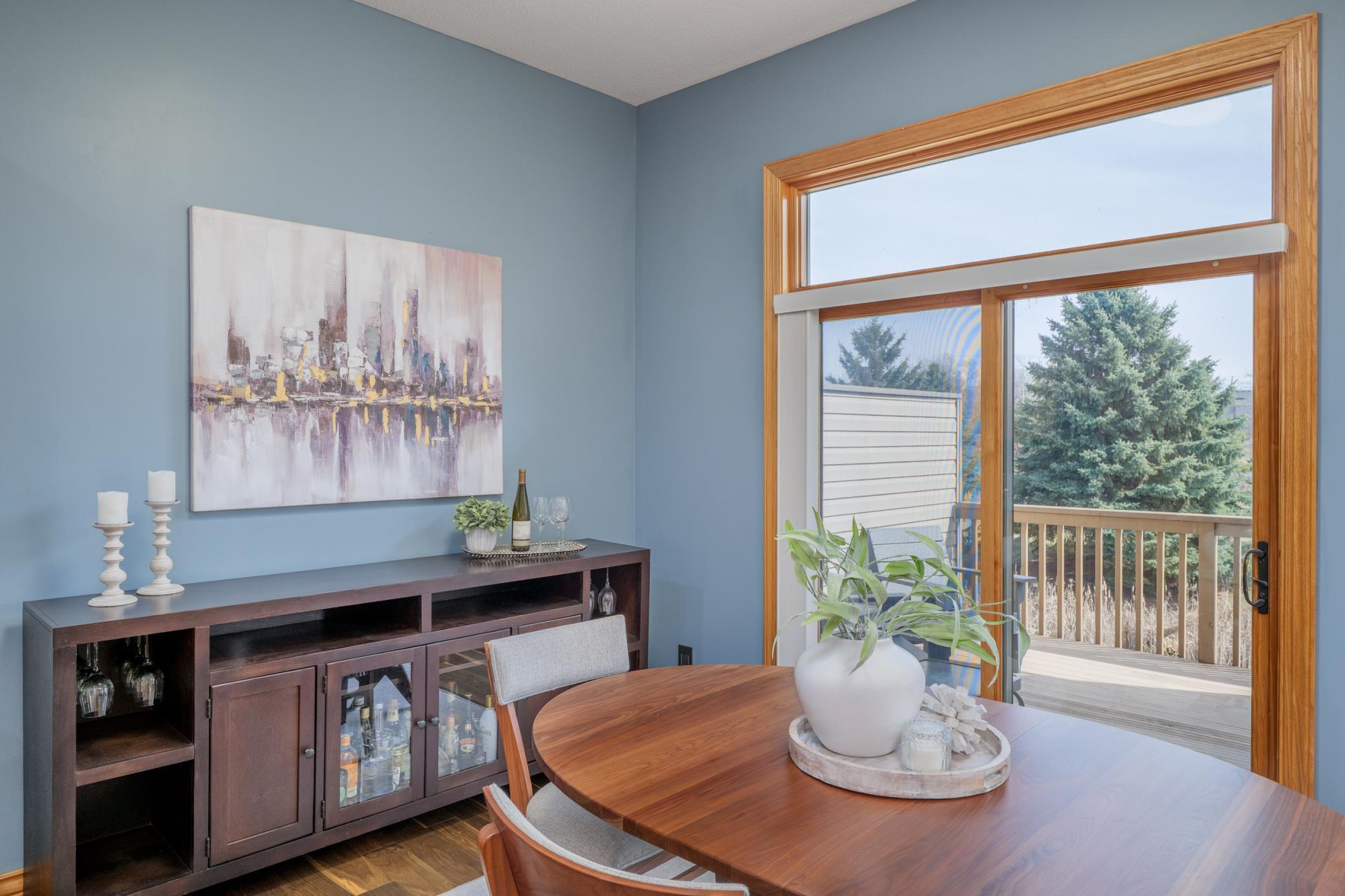 Enjoy a meal overlooking your private deck and mature trees.