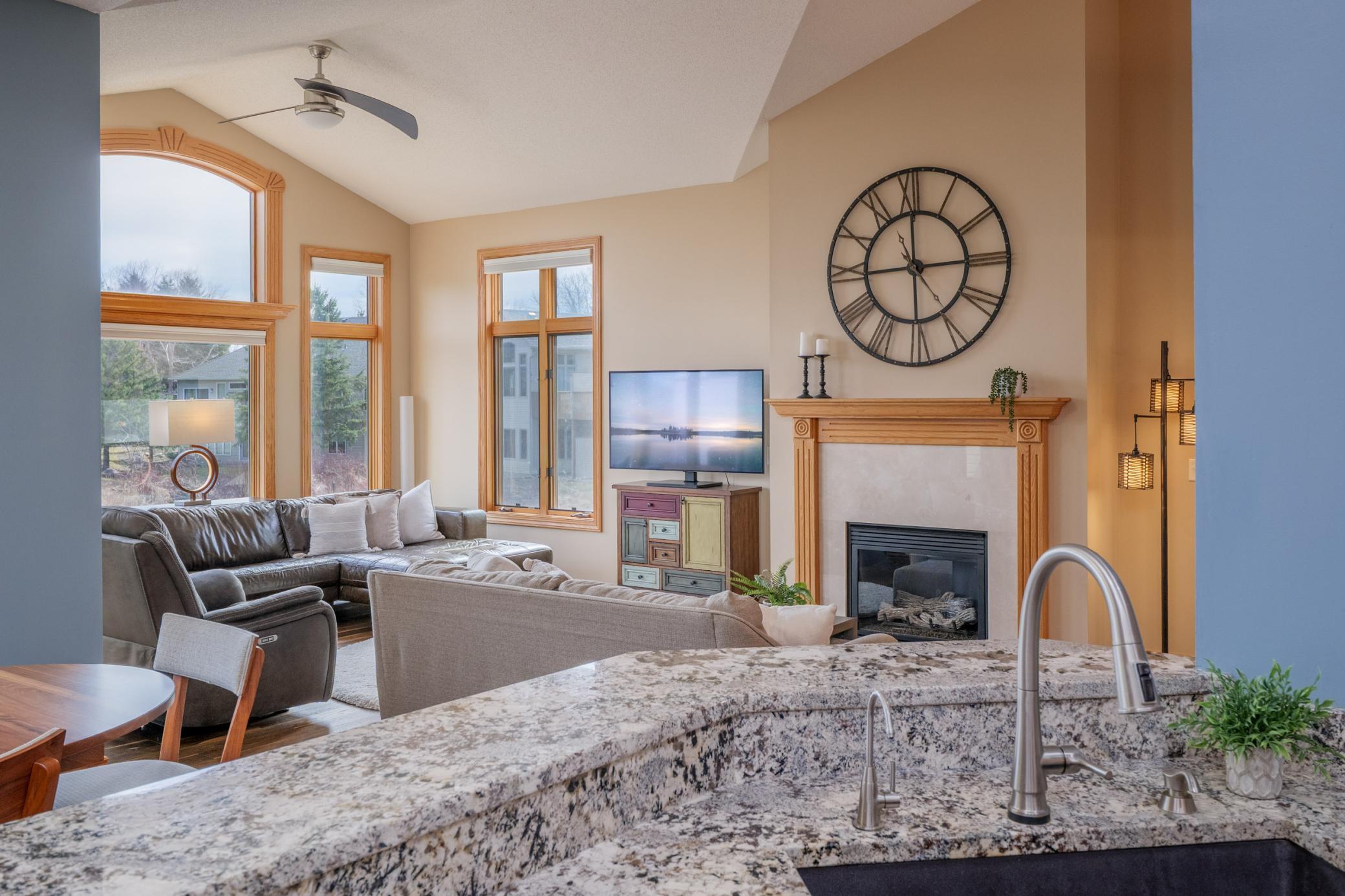 The kitchen is complete with beautiful granite countertops.