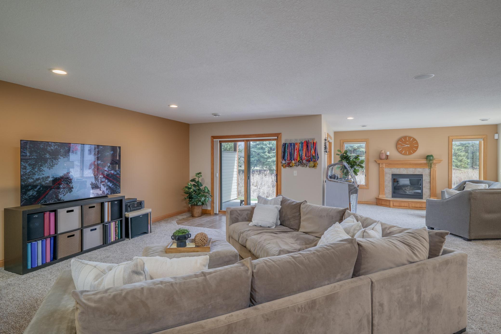Lower level family room is perfect for movie nights, hobbies, or multigenerational living.