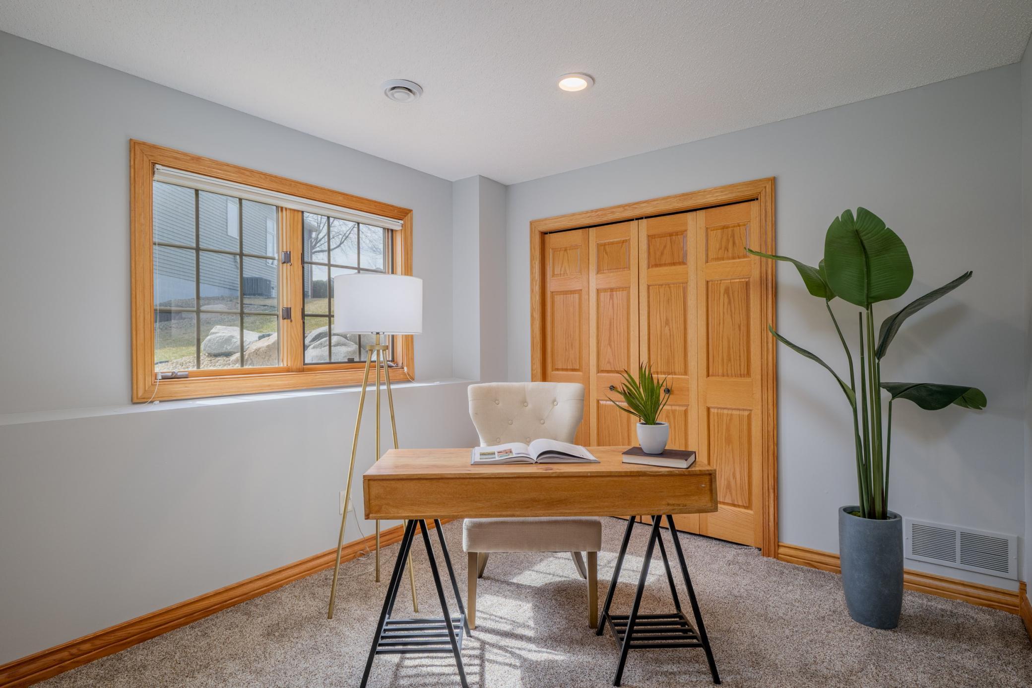 Fourth bedroom is located in the lower level and can serve multiple purposes.