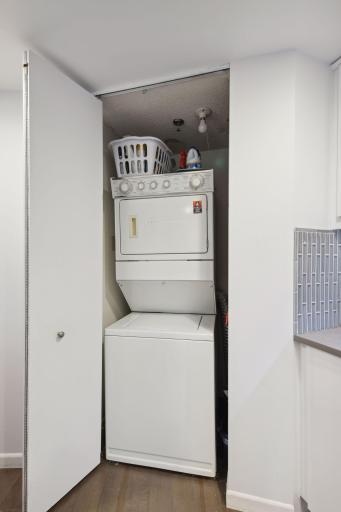 In unit washer dryer is conveniently located in the kitchen closet