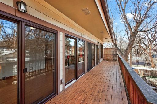 Upstairs deck runs the whole width of the home