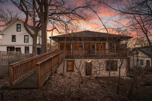 Upstairs deck has it's own bridge out to the yard