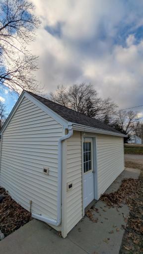 Garage Exterior with Gutter detail and pathway