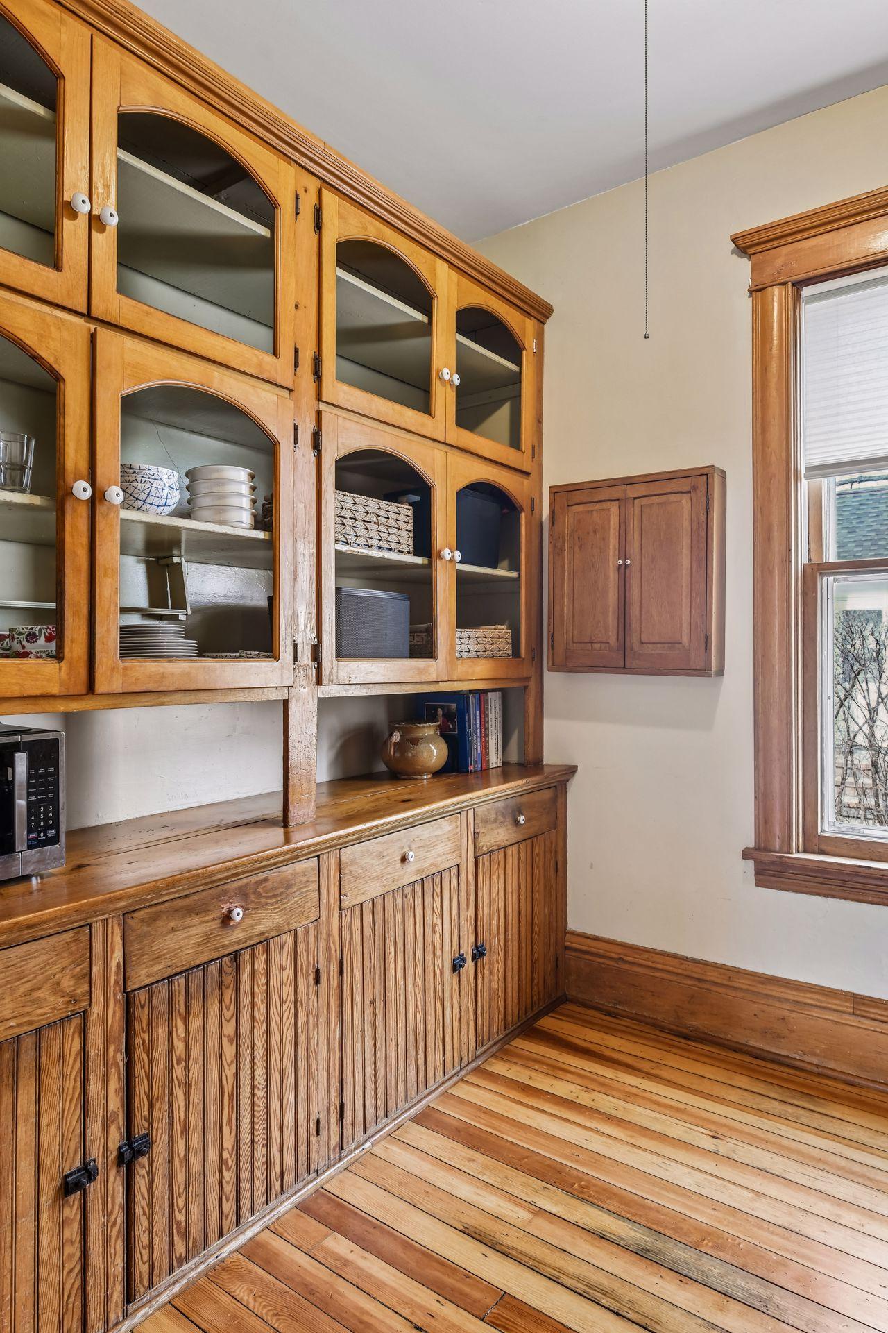 A generous walk-in pantry offering plenty of storage space