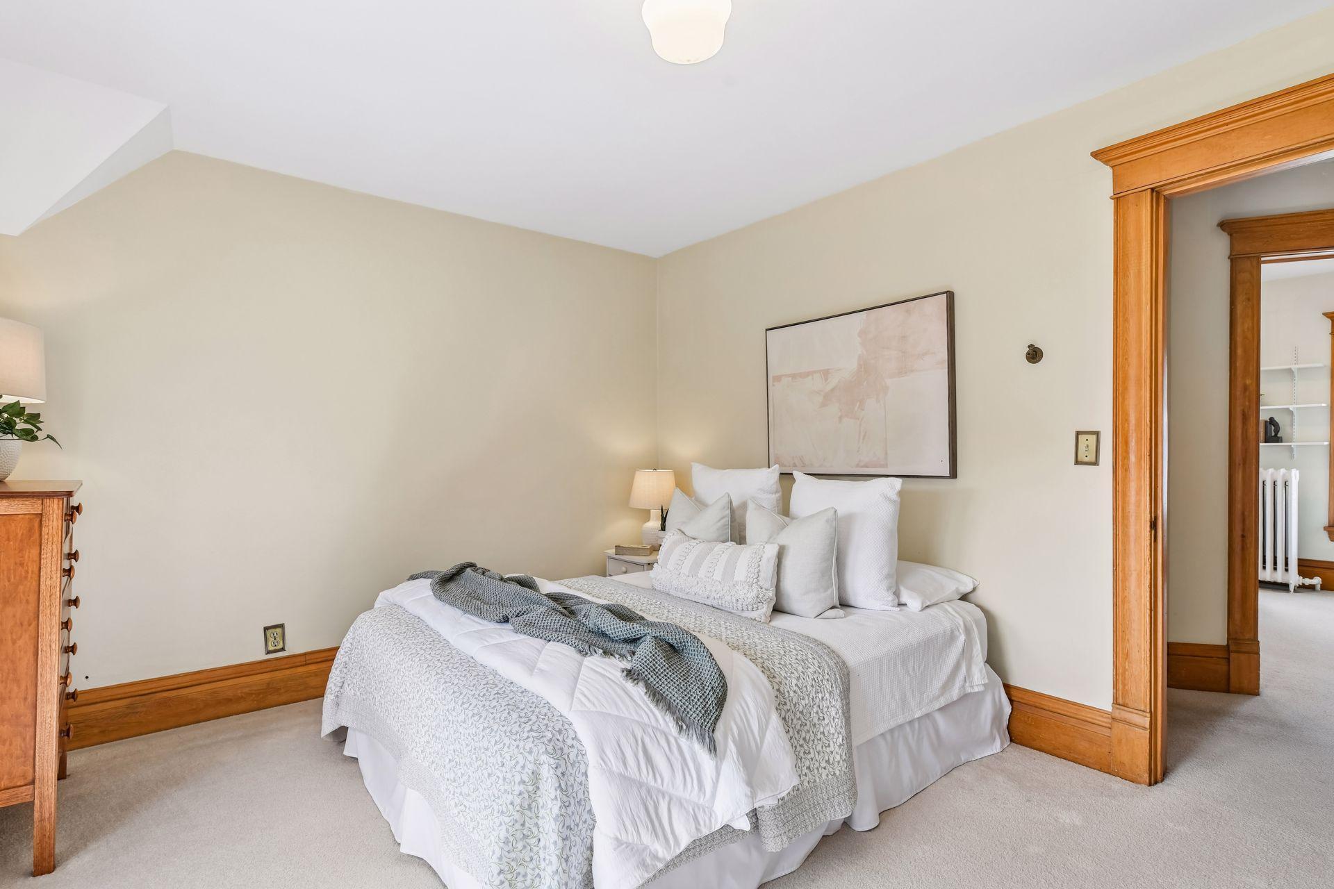 Down the hall are three more spacious bedrooms.