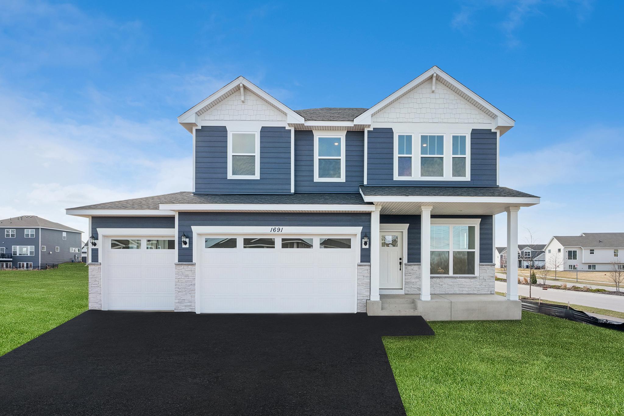 Three car garage-previous home with different exterior