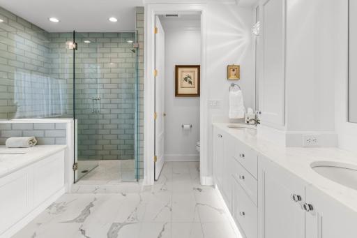 Spa-inspired bathroom with heated floors