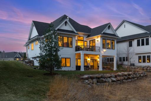 Gracefully positioned at the end of an exclusive cul-de-sac and enveloped by lush, tree-top views, this 3-year-old home is the epitome of refined luxury and effortless main-level living.