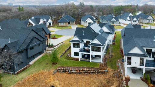 Overlooks serene backyard and natural landscape