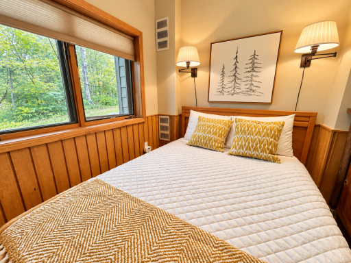 Lower level bedroom with view to Moose Access Trail.png