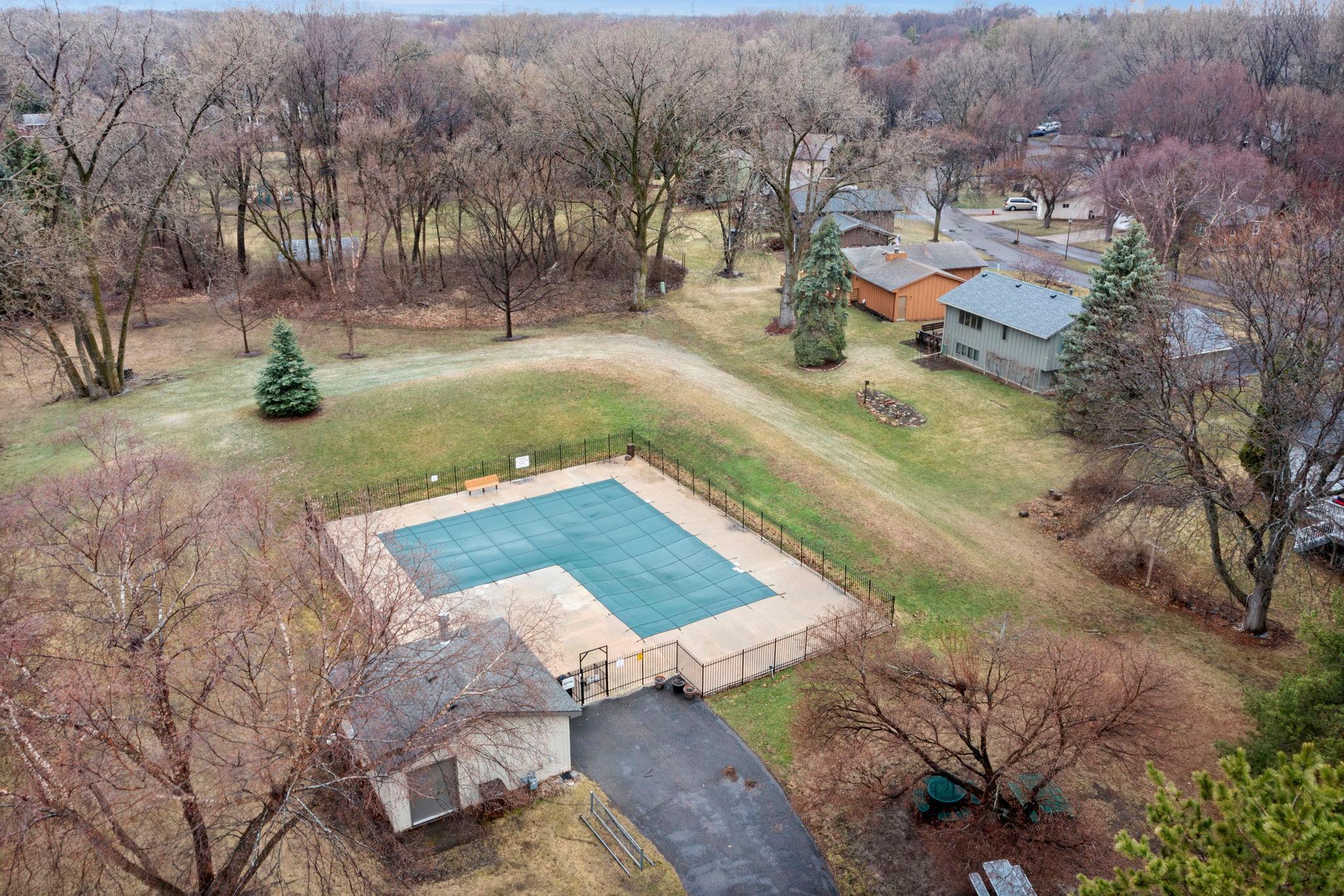 Community swimming pool showing home in the background!