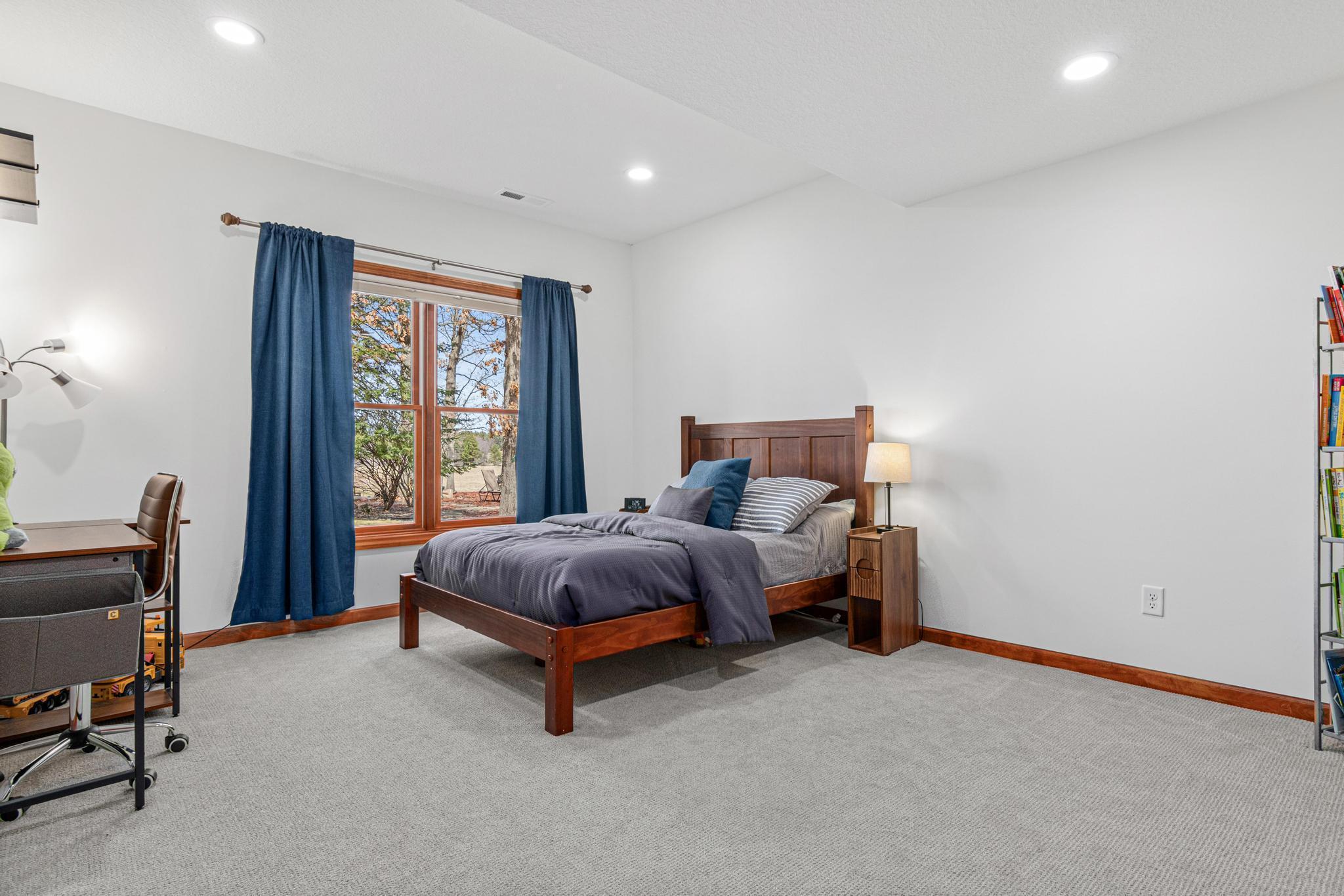 Additional lower-level bedroom with ample space and beautiful views!