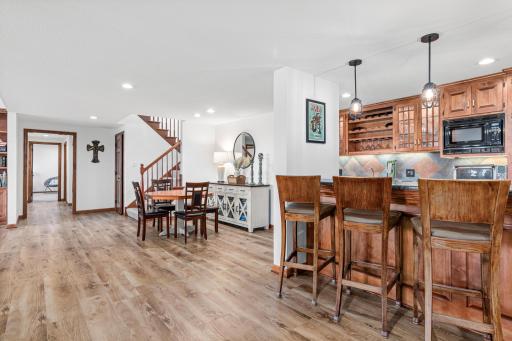 The lower level has it all! Two spacious bedrooms, two bathrooms, a study, an exercise room, expansive storage rooms, family room and bar.