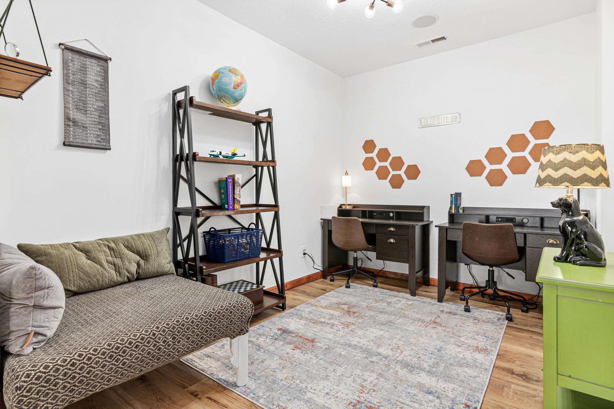 Lower-level study provides a quiet retreat for work, reading, or hobbies.