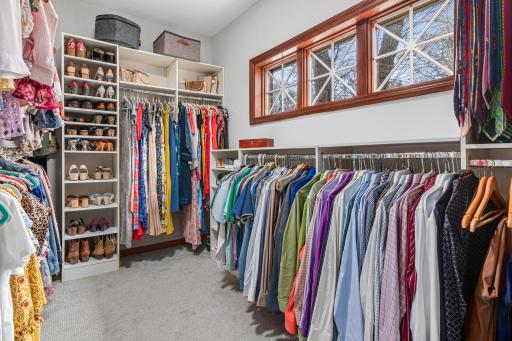 Fantastic owner's closet with dynamite organizing system.
