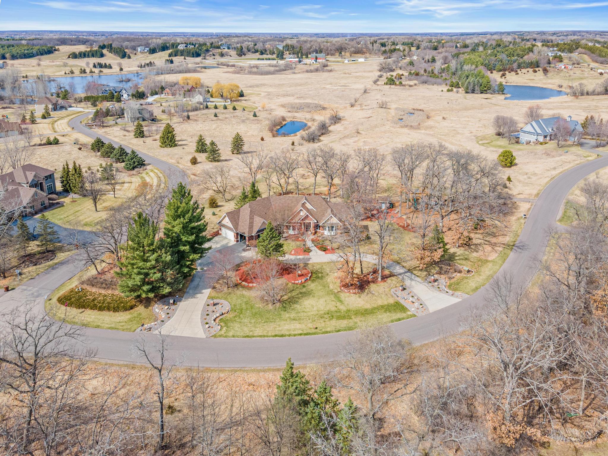 A rare five-acre estate offering remarkable privacy, framed by mature trees and picturesque natural surroundings.