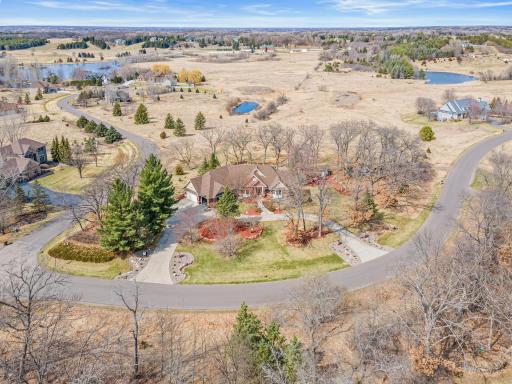 A rare five-acre estate offering remarkable privacy, framed by mature trees and picturesque natural surroundings.