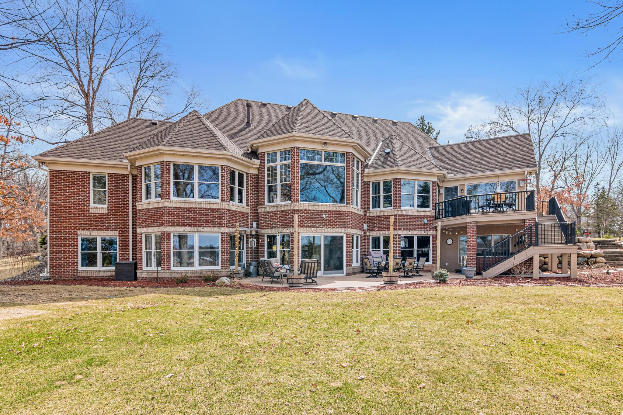 Resort-like grounds provide a serene and secluded setting with multiple areas to relax and enjoy the outdoors.