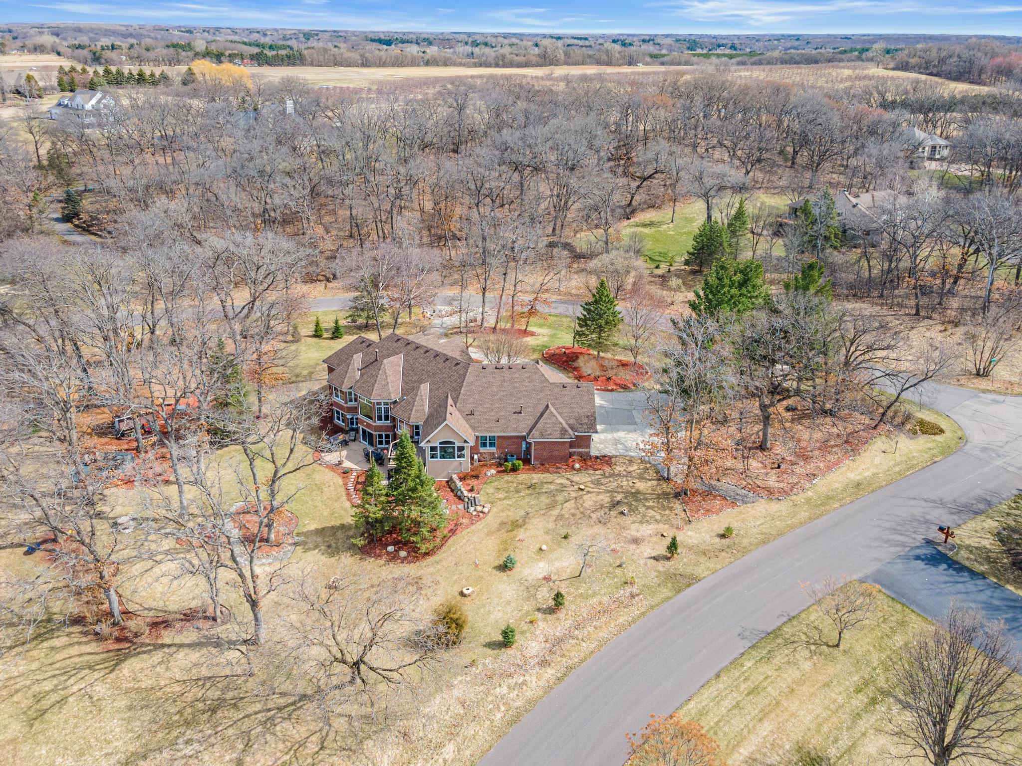 Private, tree-lined acreage offers a rare combination of space, tranquility, and natural beauty. This home is exceptional, inside and out!