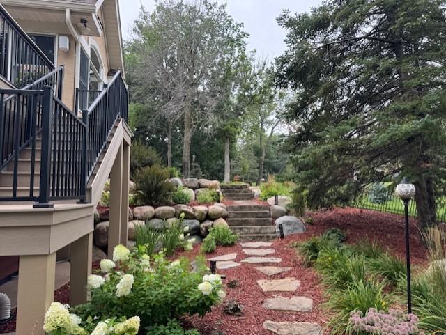 Beautiful, professionally landscaped spaces throughout the yard.