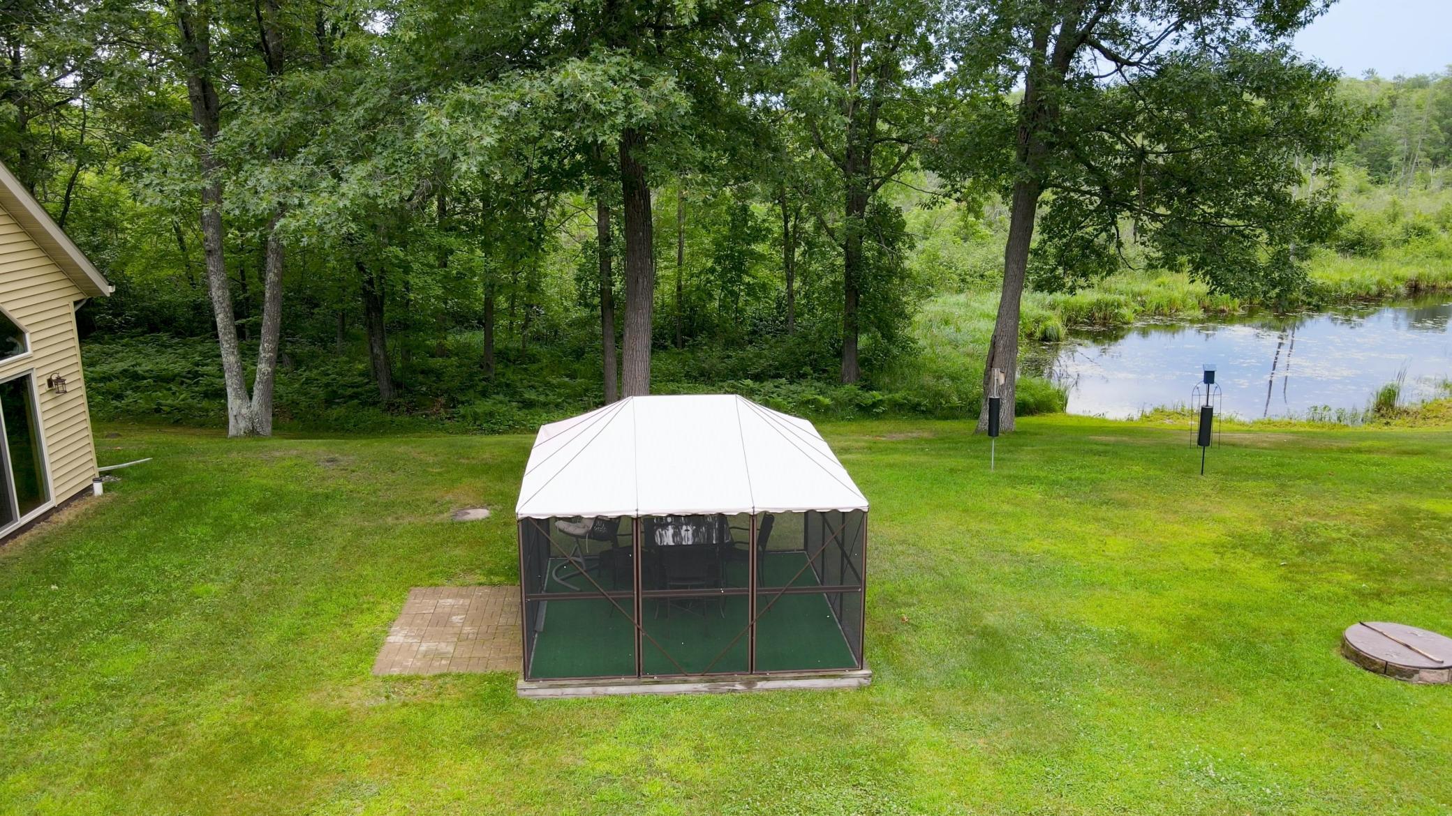 Screen house in side yard