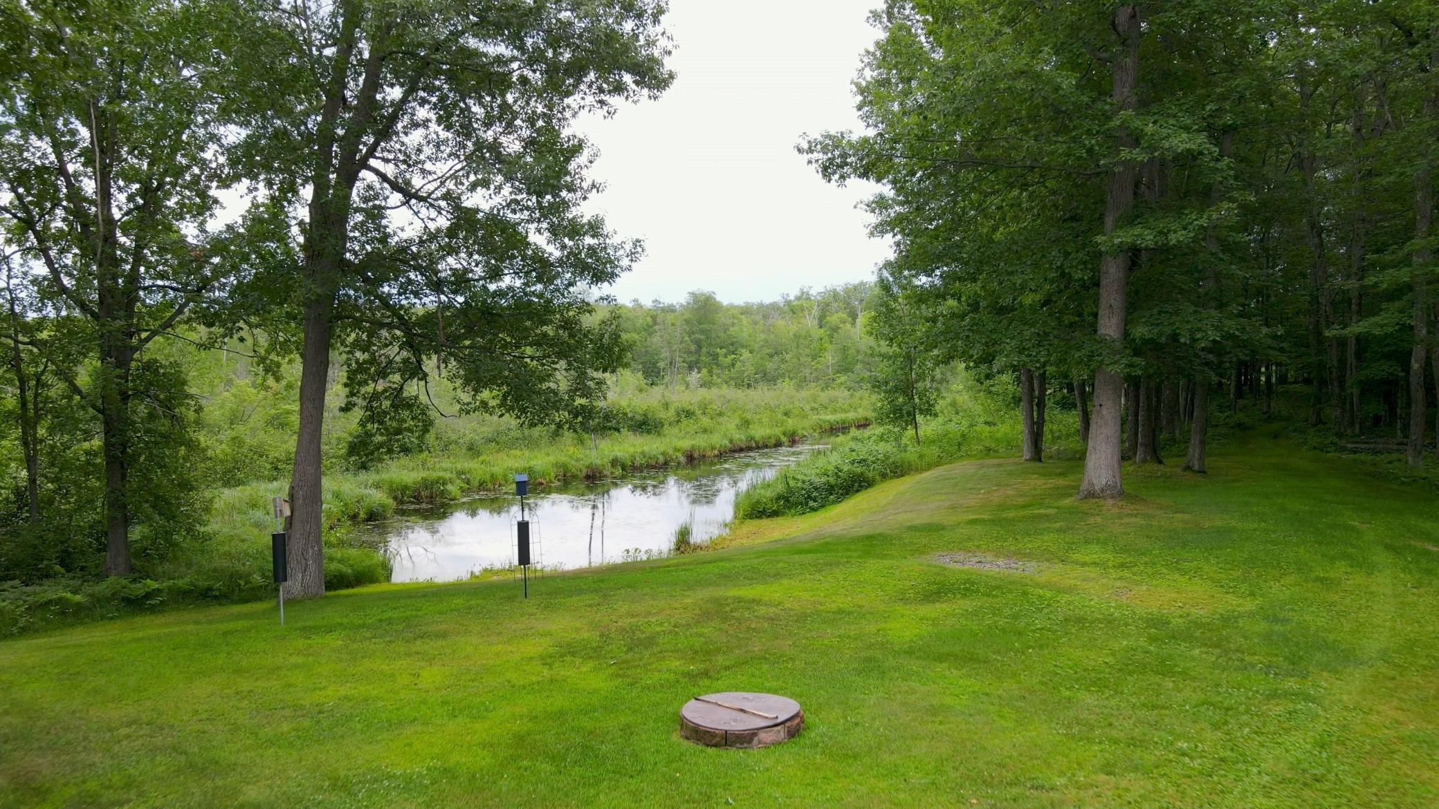 Yard overlooking the pond