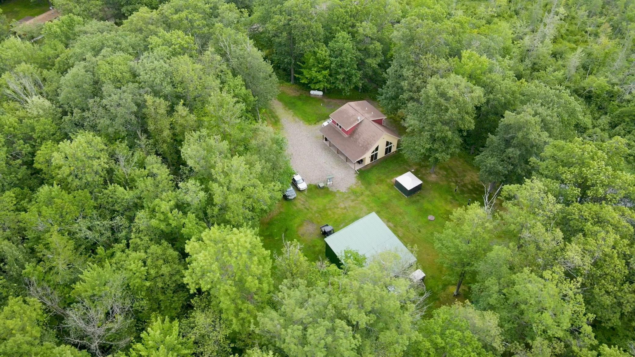 Home tucked away in the woods
