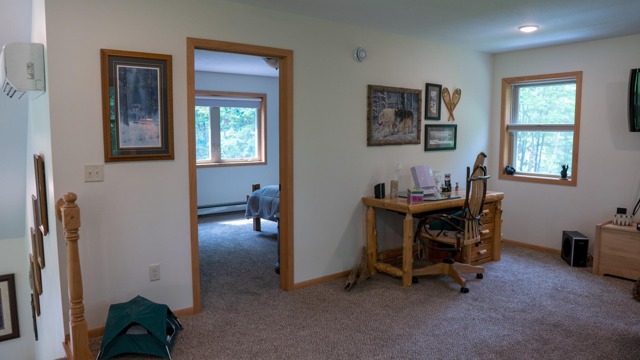 Upstairs loft leading into second bedroom