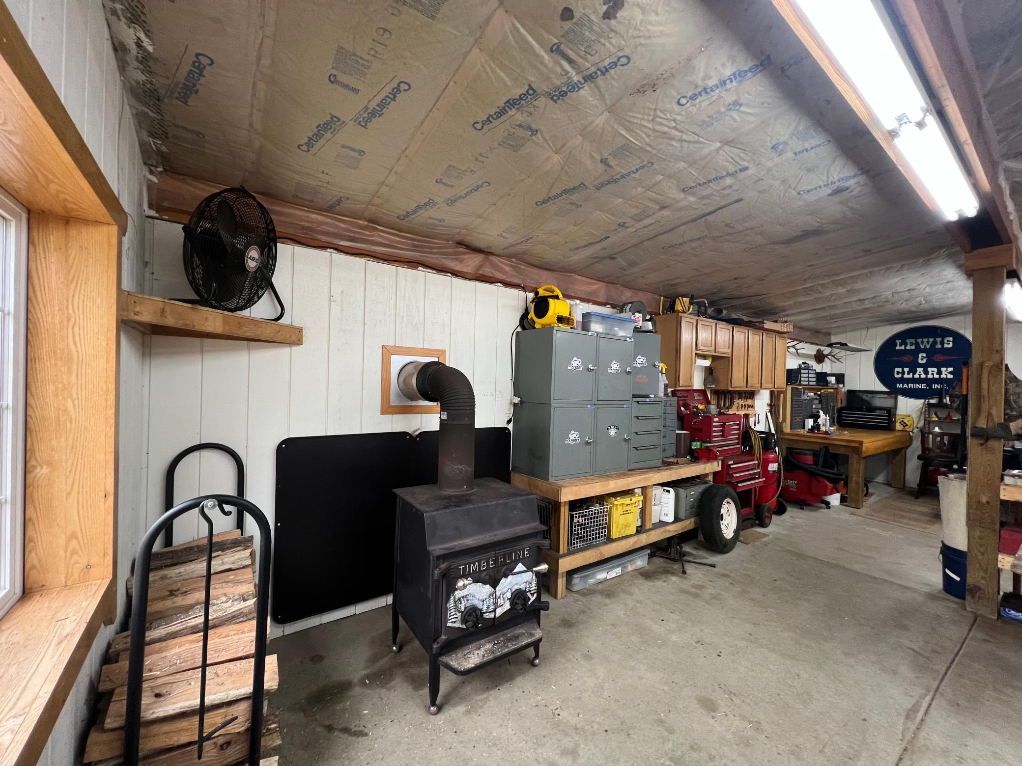 Insulated and heated by a wood burner, makes for an excellent workshop