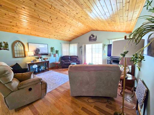 Vaulted Livingroom with access to backyard patio.jpg
