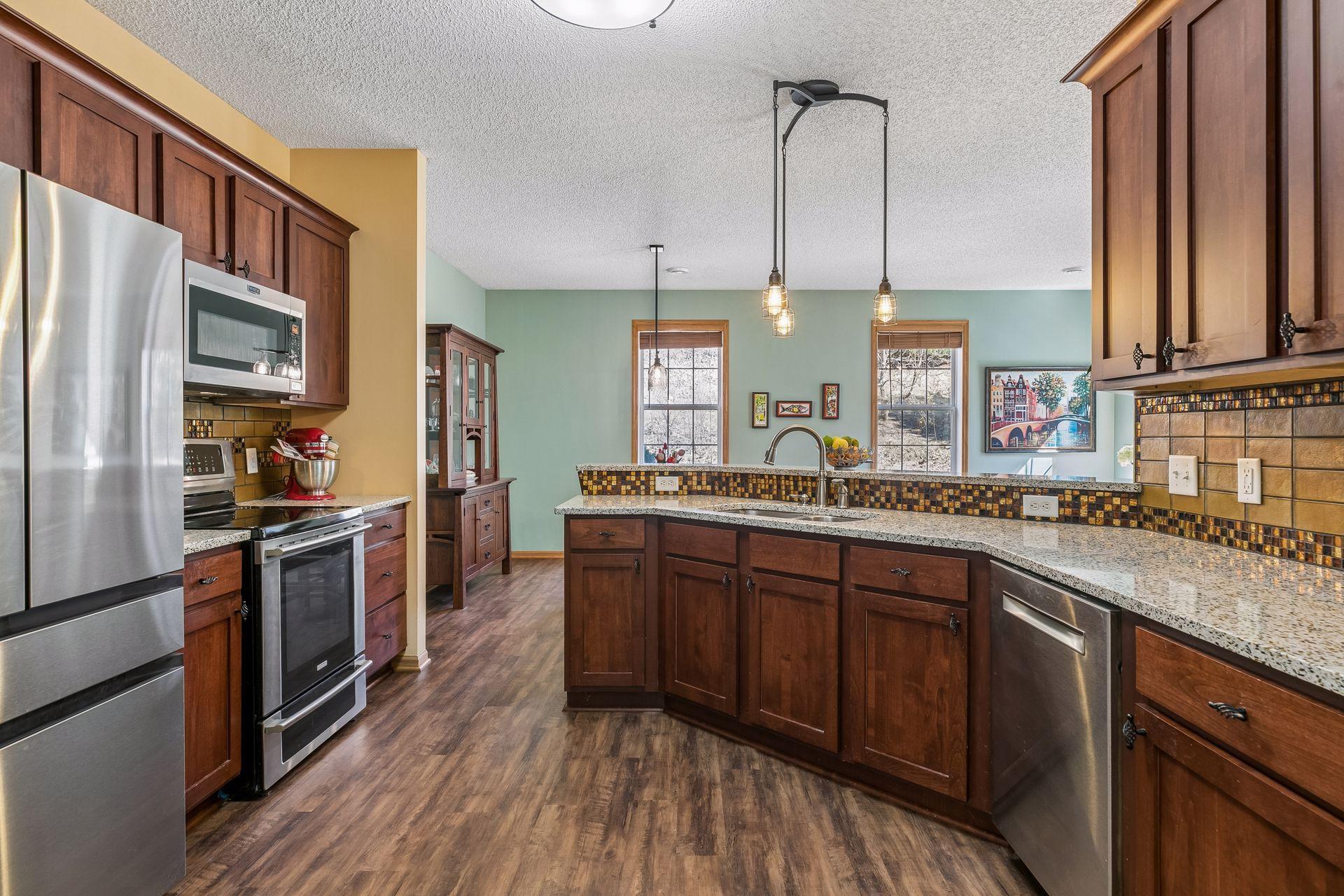 Beautiful kitchen with rich wood cabinetry