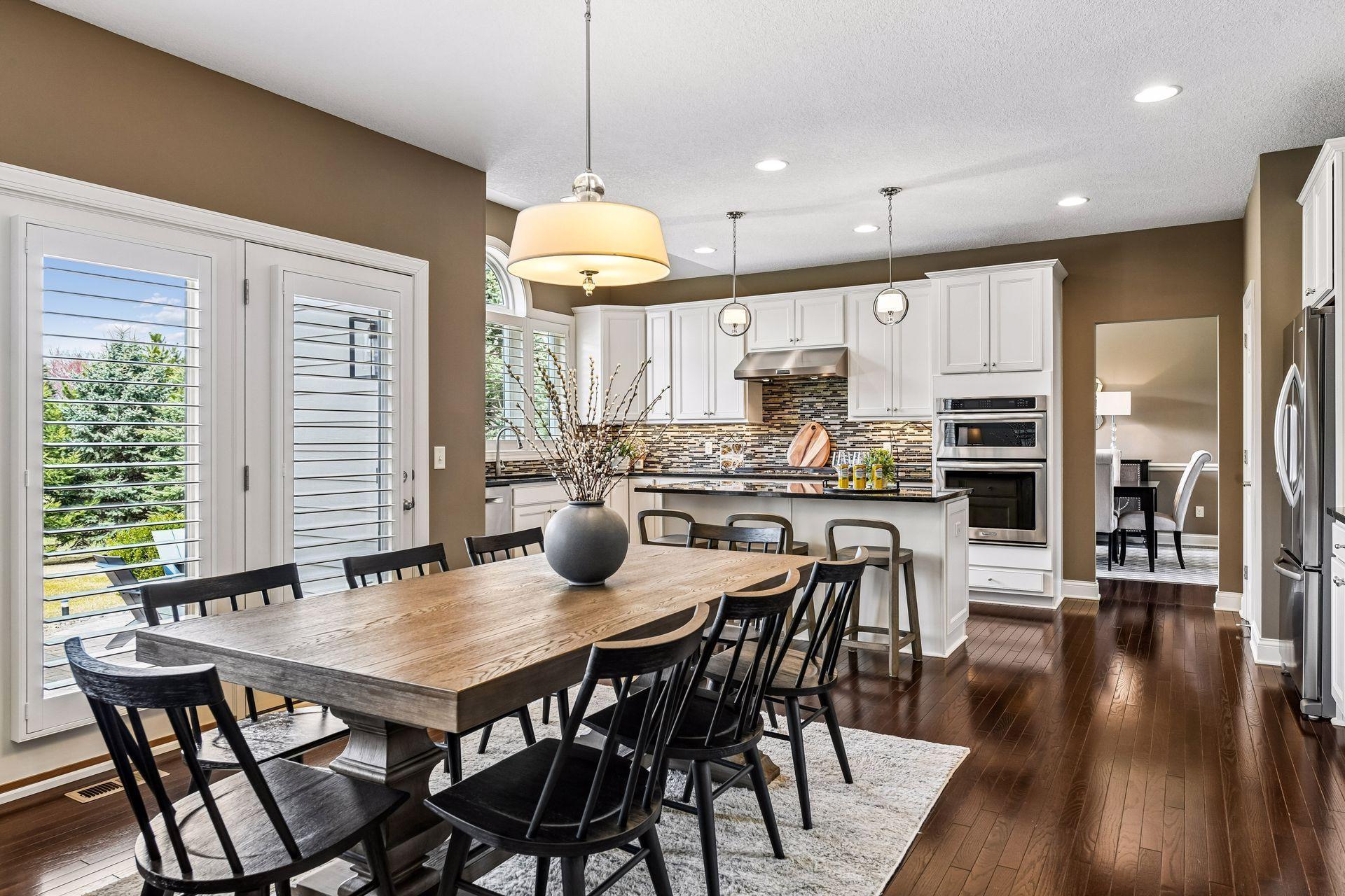 Sunlit informal dining area opens to the kitchen. Ideal for everyday living and easy entertaining.