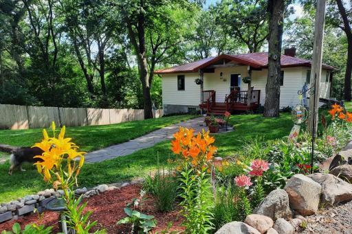 From the moment you walk towards the home you will fall in love with the mature trees and perennial gardens that surround the property. This area is full of wildlife from deer to turkeys and so much more. Schedule your private showing today!