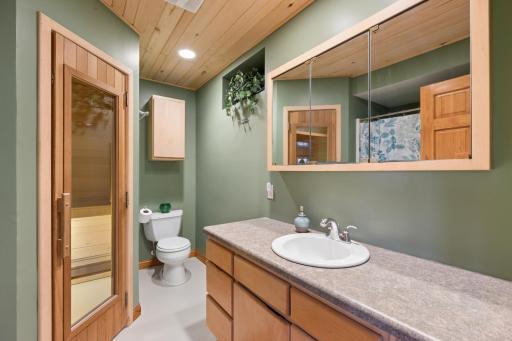 The lower-level 3/4 bath is complete with a sauna for relaxing after long days on the lake or hiking the area trails.