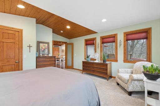 The main floor bedroom also has a generously sized closet. You will love the views looking out over the lake from every window in this room.