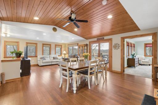 As you walk through the front door you are greeted by oversized picture windows overlooking Pickeral Lake. The Southern exposure allows plenty of natural light and great views. Bamboo hardwood floors and tongue and groove ceiling provide a warm feel.