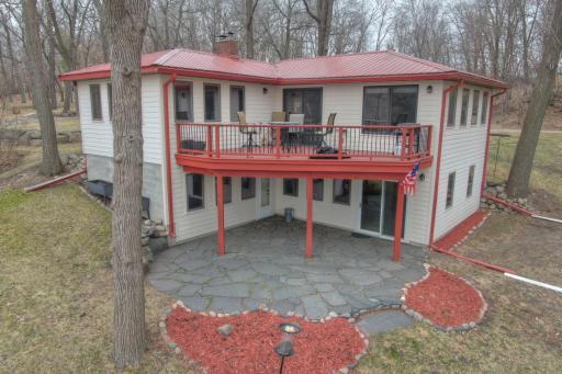 Whether it's on the deck or down below on the patio. Lakeside is the place to be. Soon these flower beds will be popping with life and the trees will be budding.