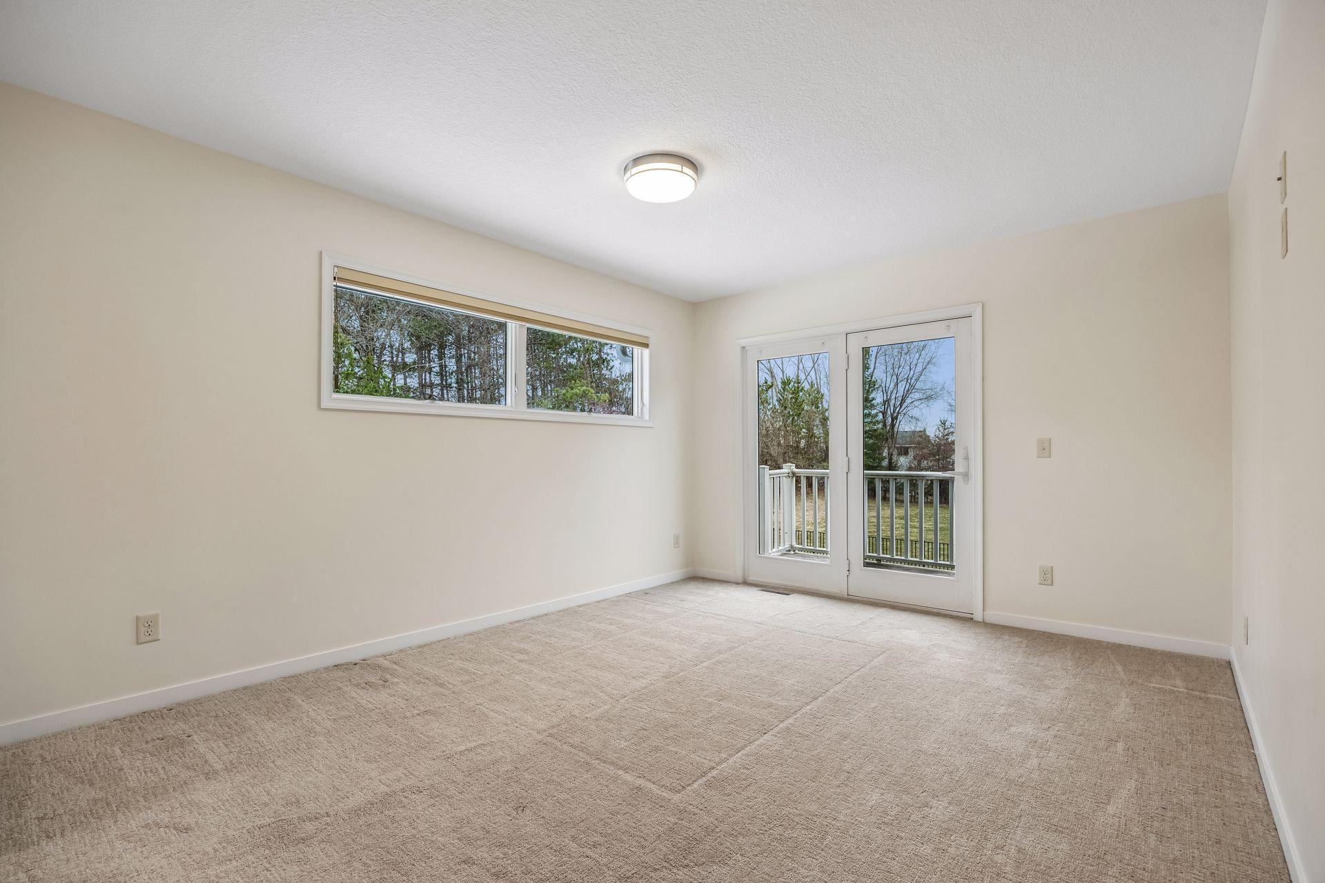 Primary Bedroom with Balcony