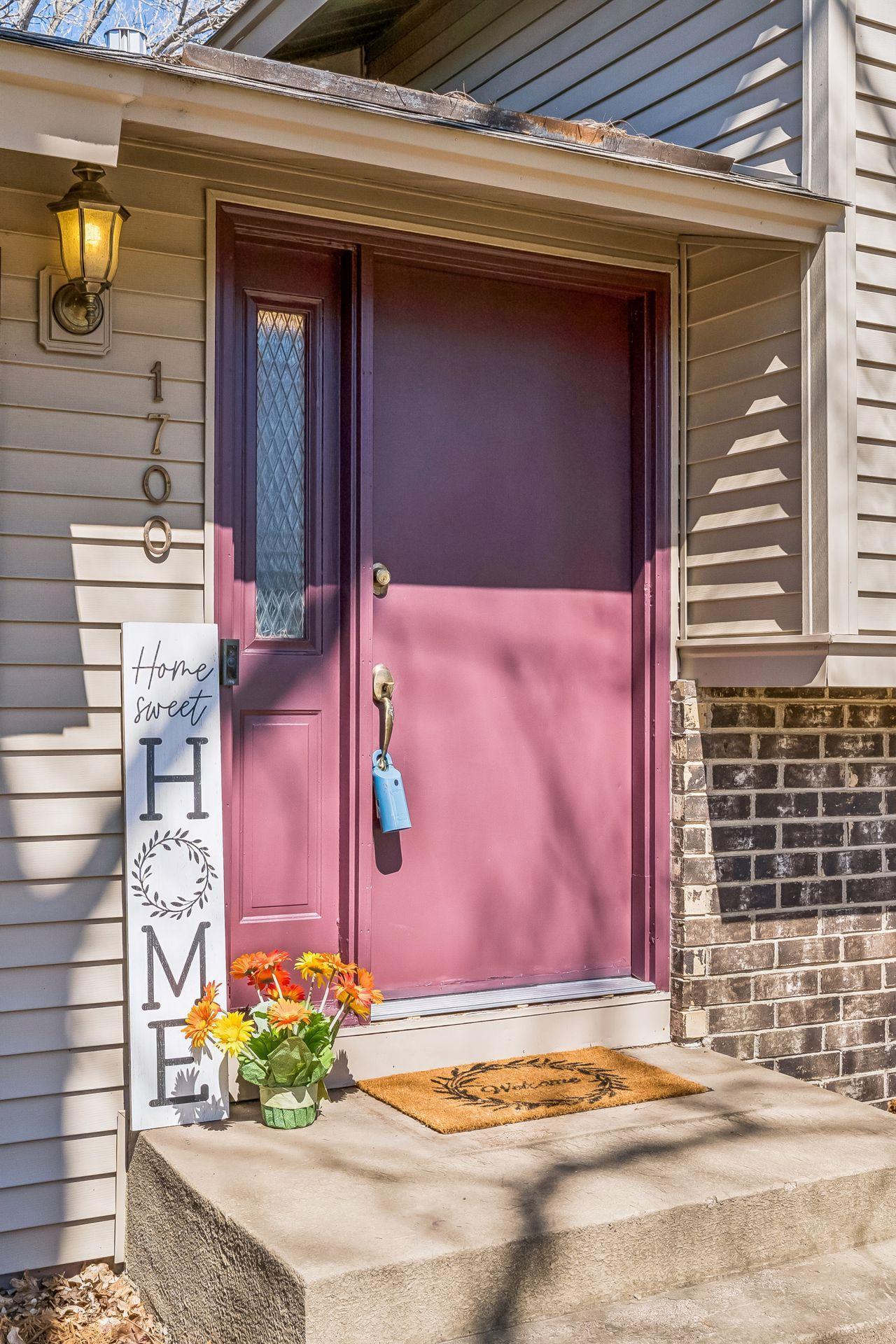 Welcoming front entry with charming porch area and inviting approach that sets the tone for this move-in ready home.