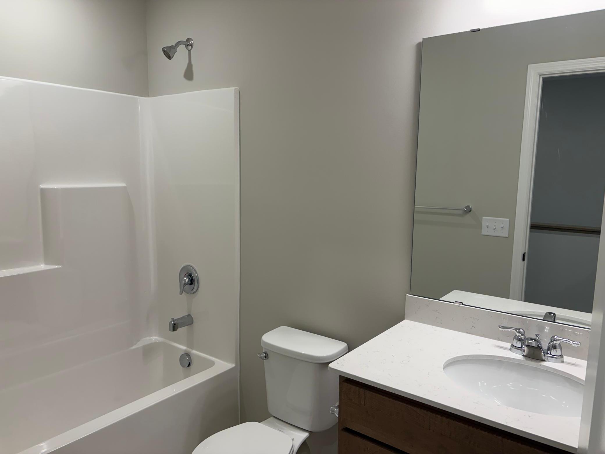 Also, on the top floor we have a shower/tub combo which is set up great for secondary use and for when the fur babies need a bath!