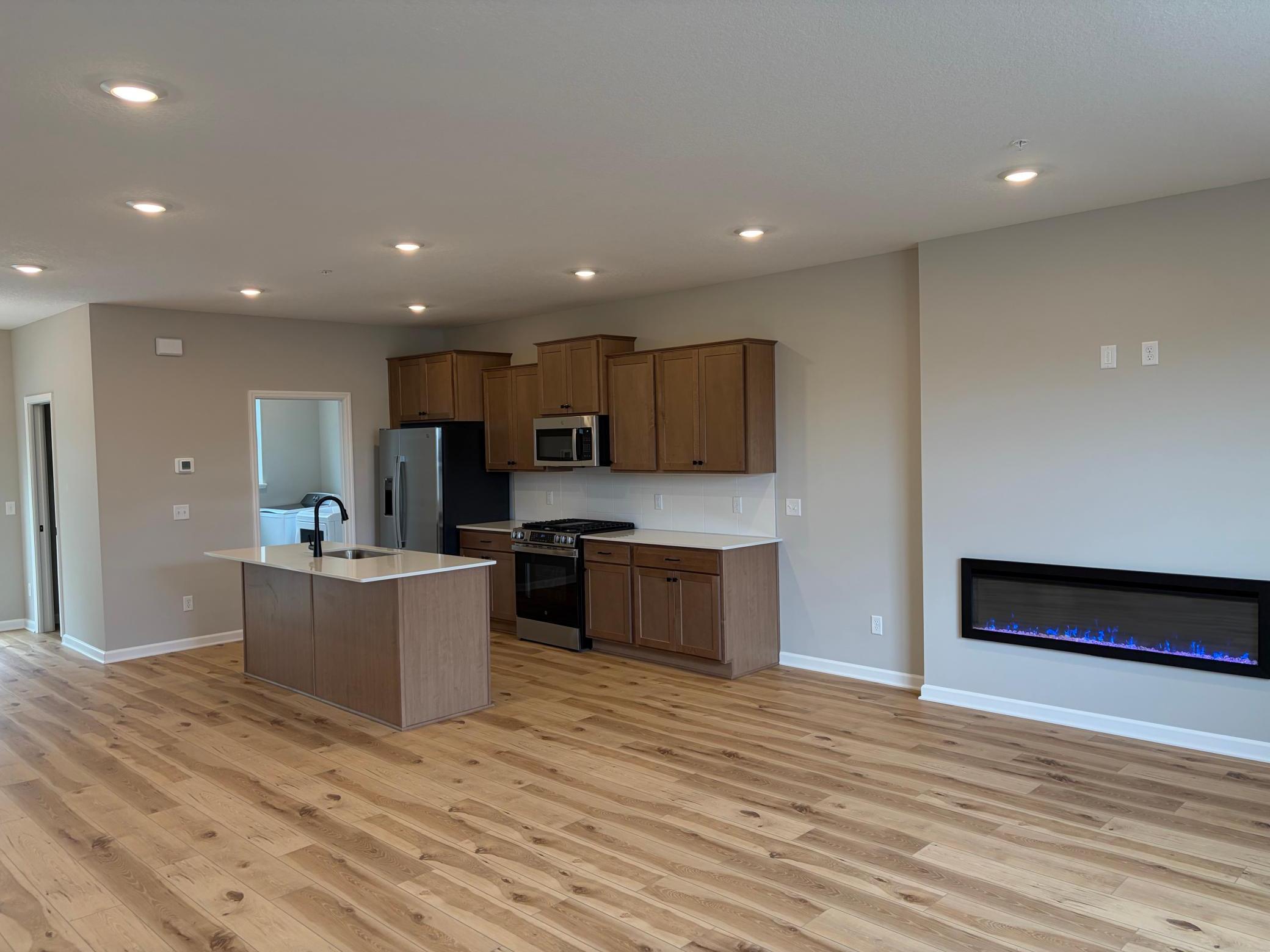 In this open floor plan, the dinette, kitchen, and living room flow flawlessly to keep everyone connected.