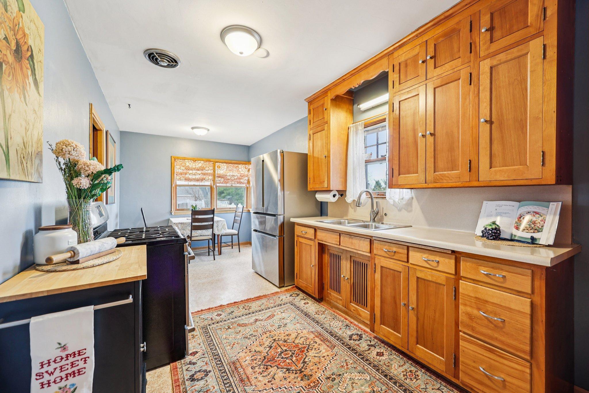 Beautiful solid wood original cabinetry.