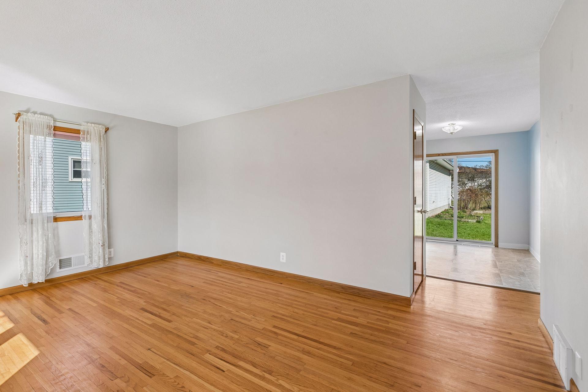 Your view as you walk in, note the gleaming hardwood floors throughout most of the main floor.