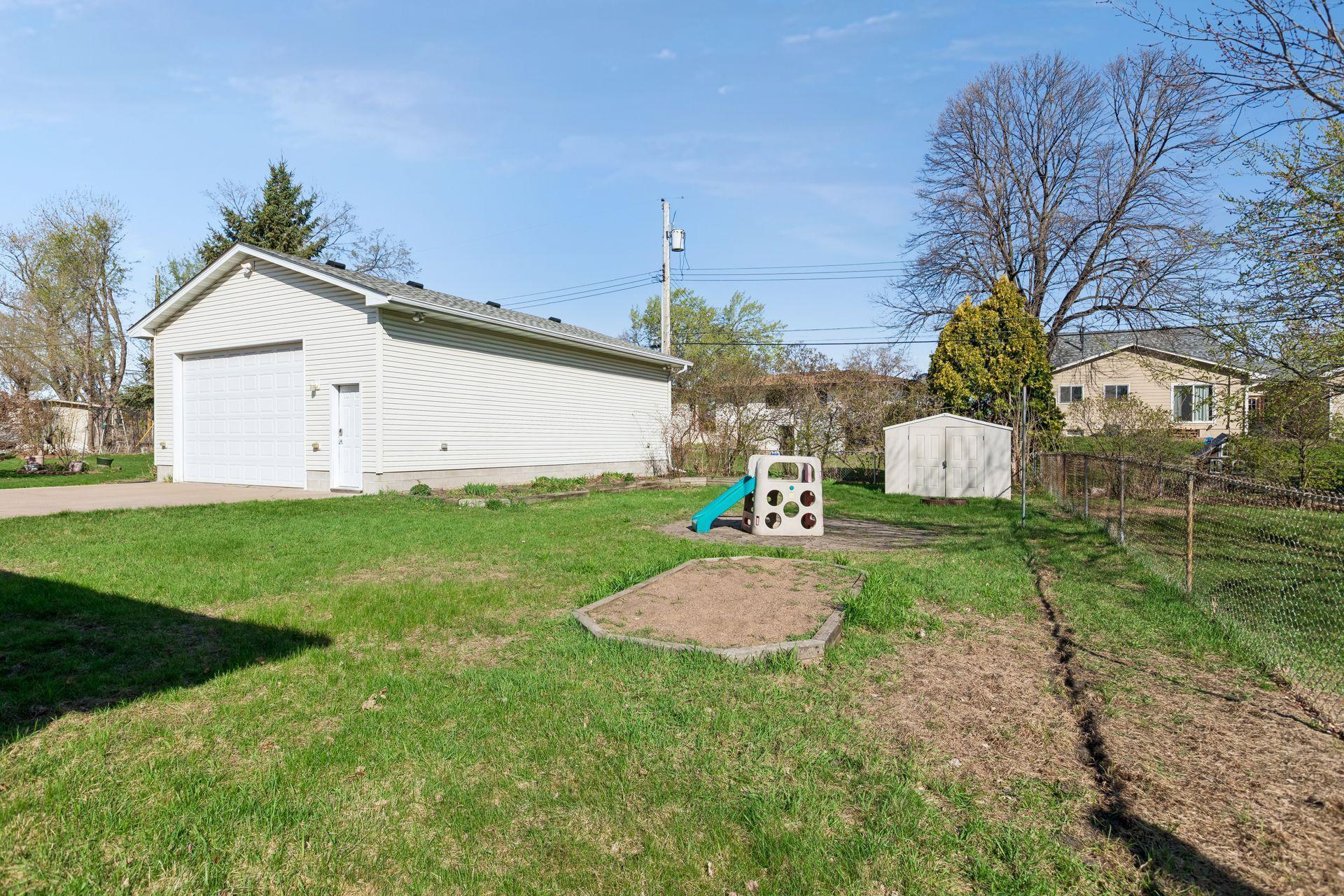 The yard is level and lush.